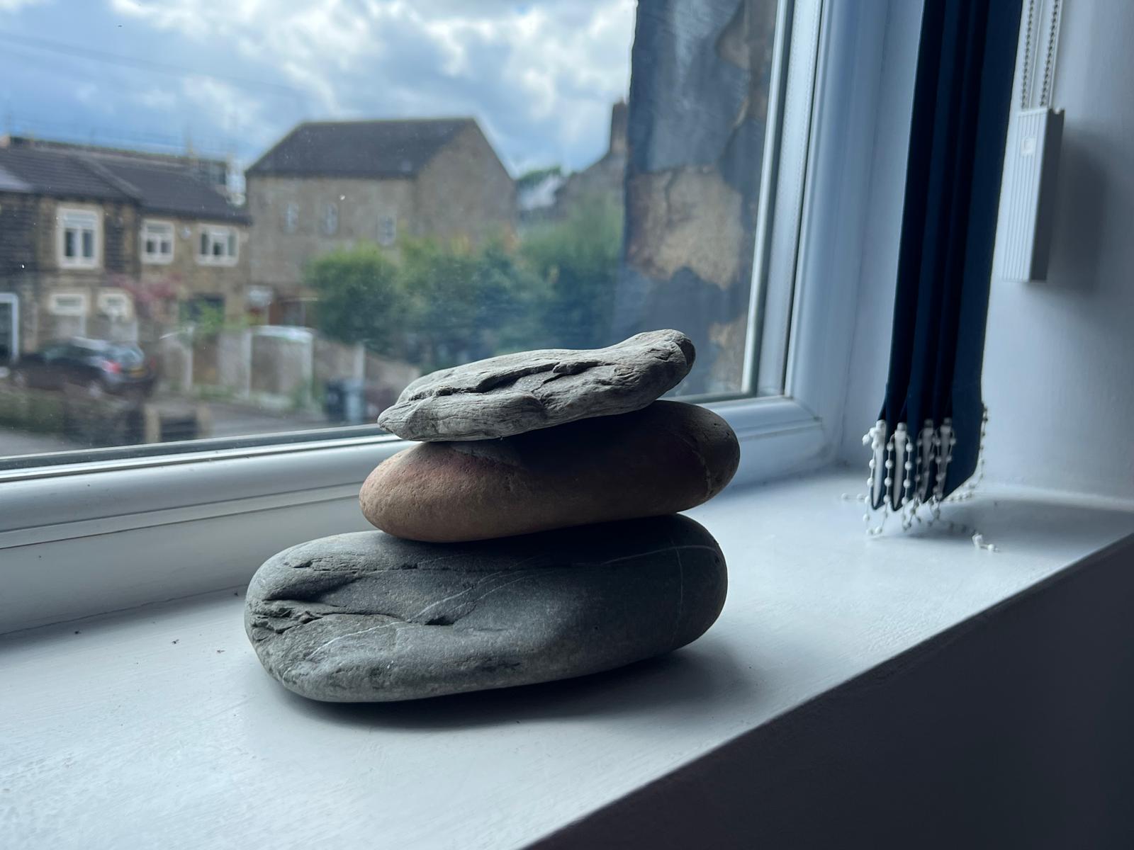 Stones representing mindfulness in therapy room Drighlington UK Counselling Network