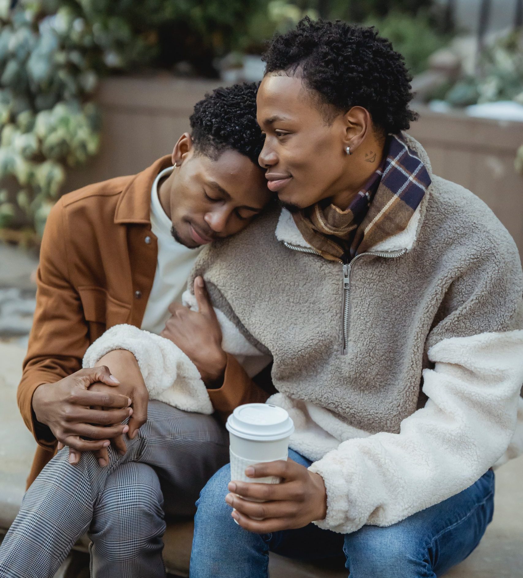 Couple sat together looking for mental health support