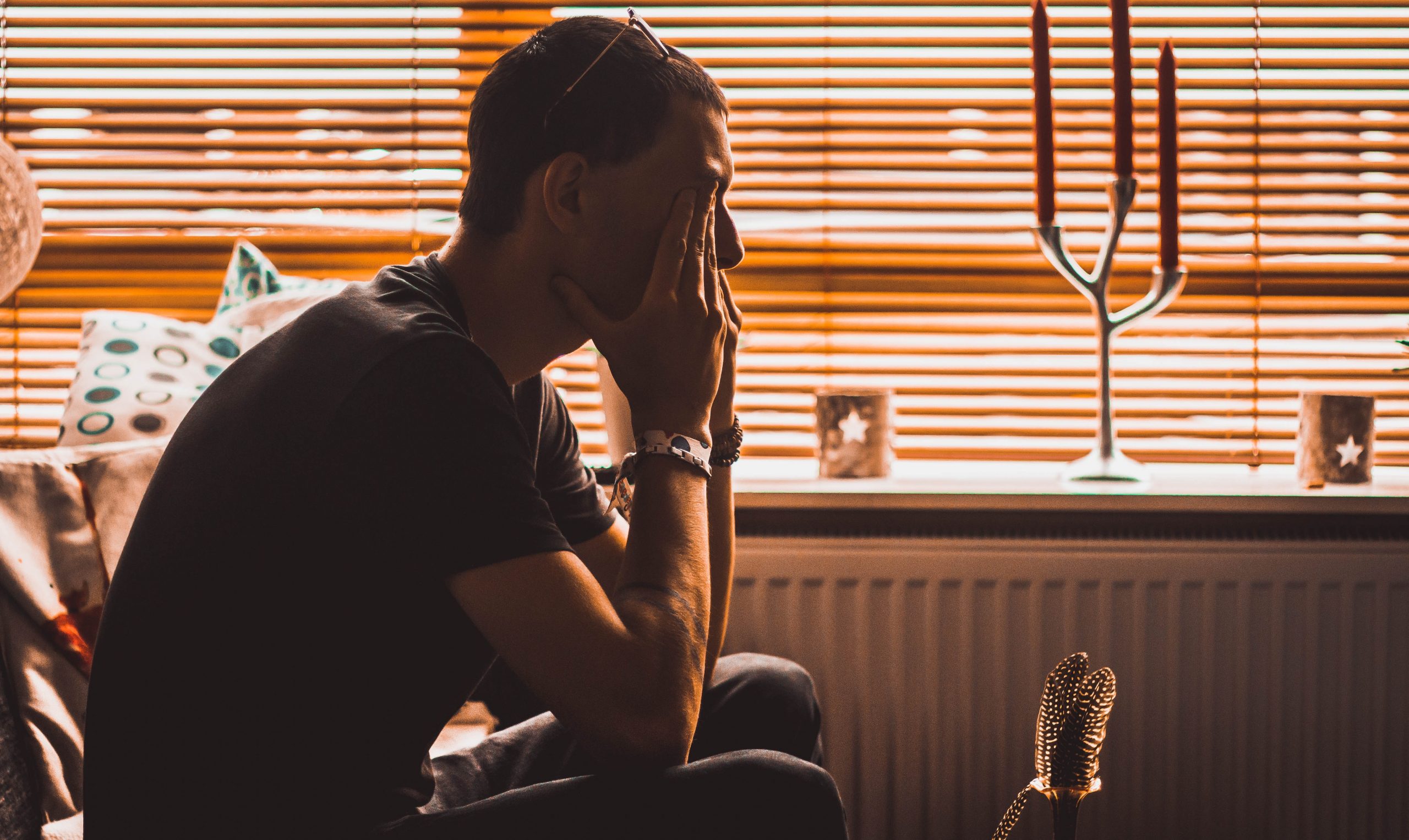 Male in therapy session seeking support for mental health